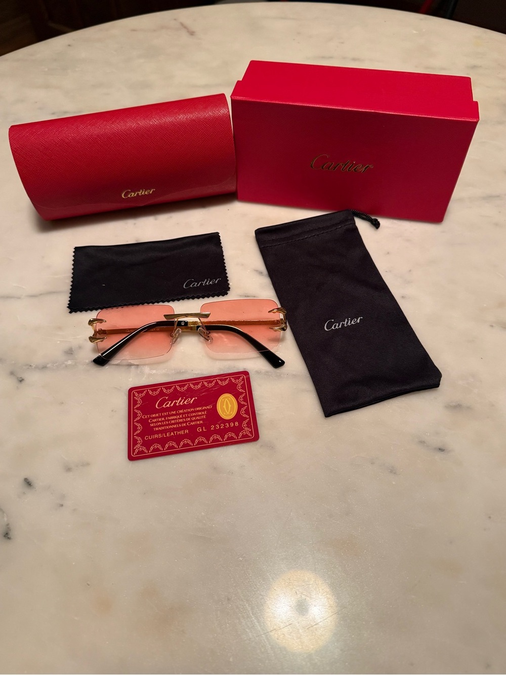 Cartier Women's Rimless Sunglasses with Pink Gradient Lenses and Gold Accents